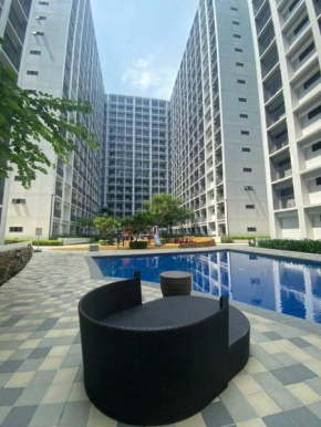1 BR family suite condo near SM Mall of ASIA MOA and airport